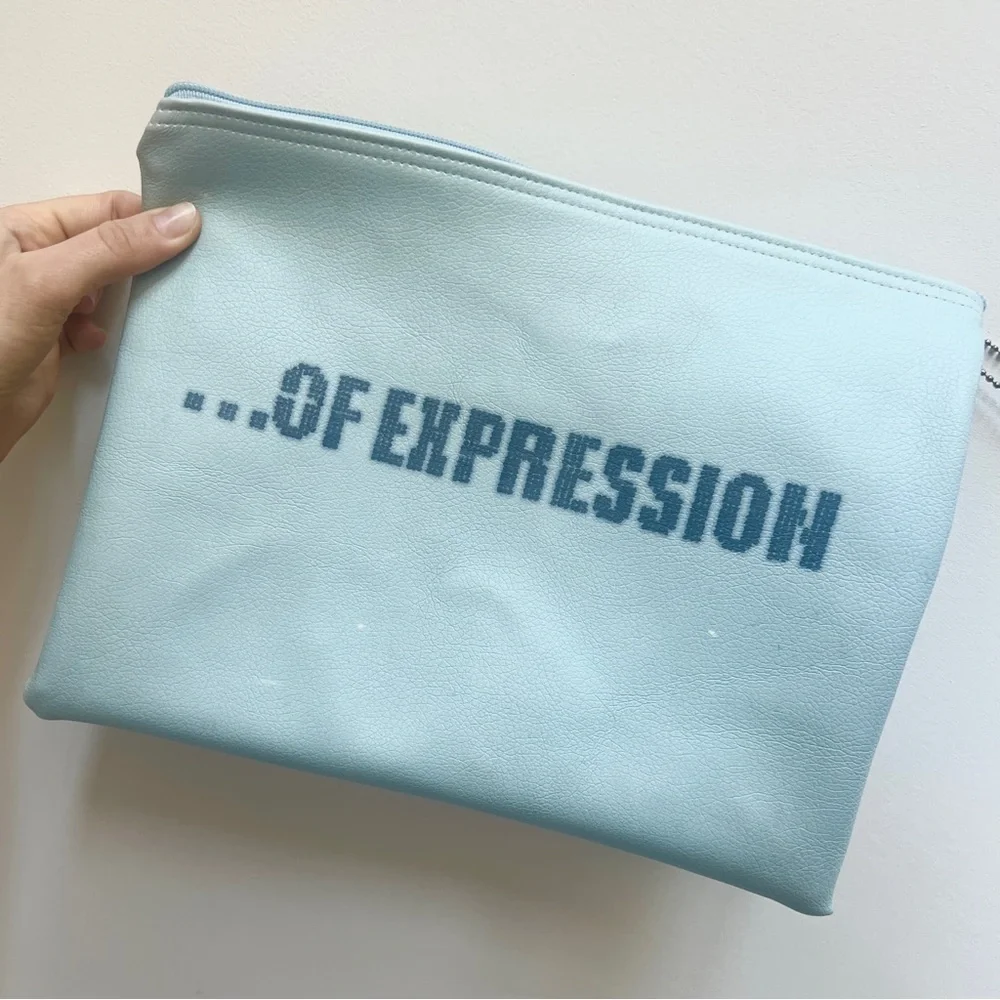 Rebecca Minkoff X Stitch Fix Freedom of Expression light blue vegan pouch bag